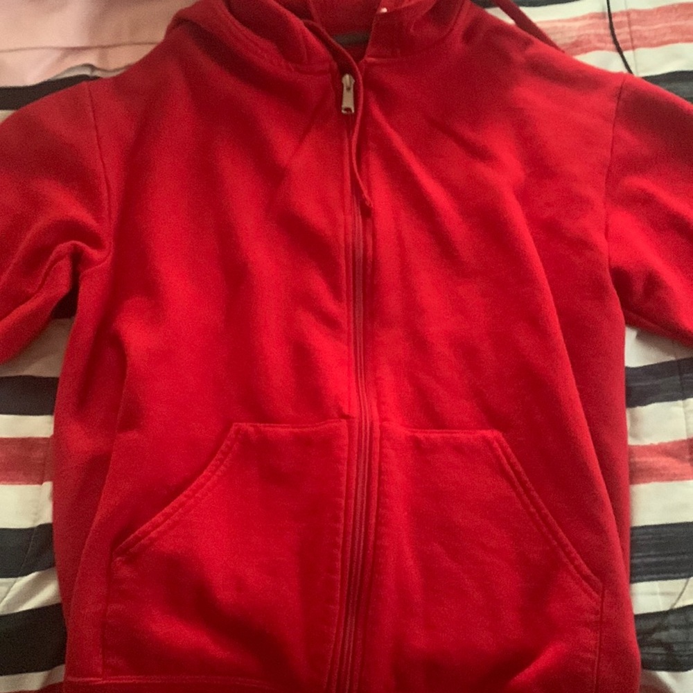 red zip up
